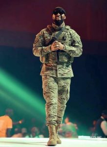 Ugandan artist Eddy Kenzo has responded to a viral photo showing him in military-style attire, clarifying that the image was AI-generated. The incident has sparked debate around digital misinformation and Uganda’s UPDF Amendment Act 2025.