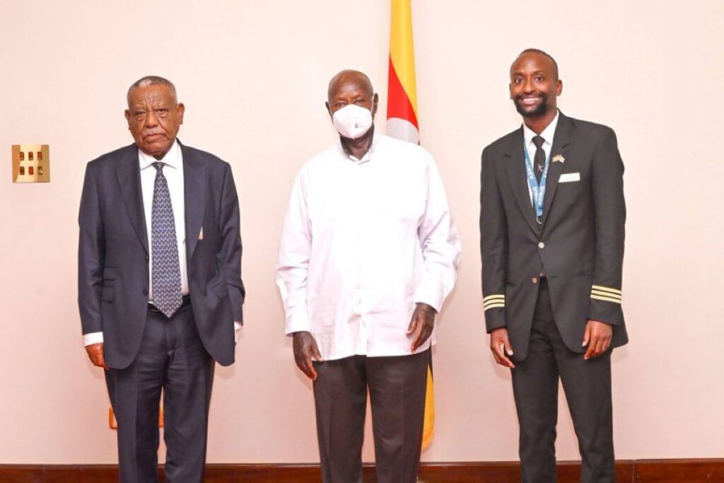 President Museveni pose for a photo with Ethiopian Airlines veteran Girma Wake at State House over Uganda Airlines leadership.