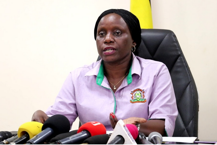 UNEB Principal Public Relations Officer, Jennifer Kalule-Musamba speaking to the press