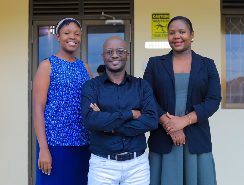 Photo of Abel Mugume, Head of Business Development, MAAD McCANN and workmates at MAAD McCANN