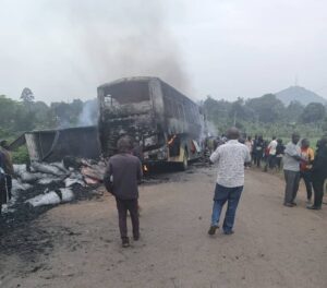 Burnt wreckage of an Isuzu bus and Fuso Fighter truck after a fatal head-on collision along Hoima–Kiboga Road in Kyankwanzi.