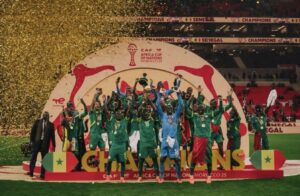 Senegal’s national team poses with the AFCON trophy