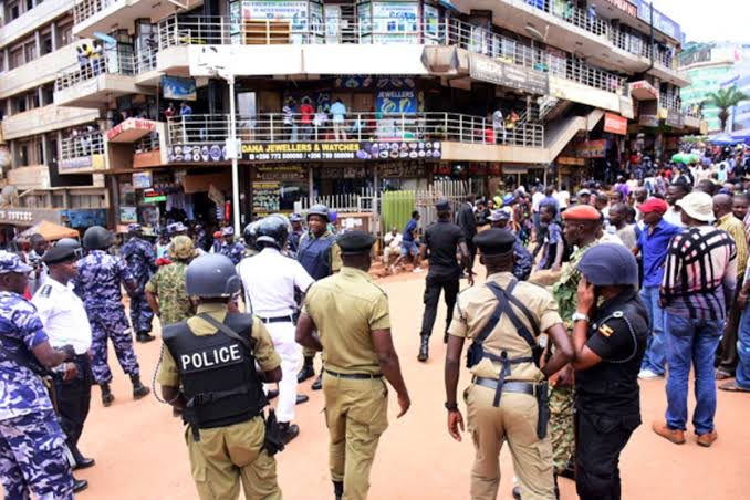 Police and military forces have raided three major commercial arcades in Kampala in a crackdown on stolen electronics.